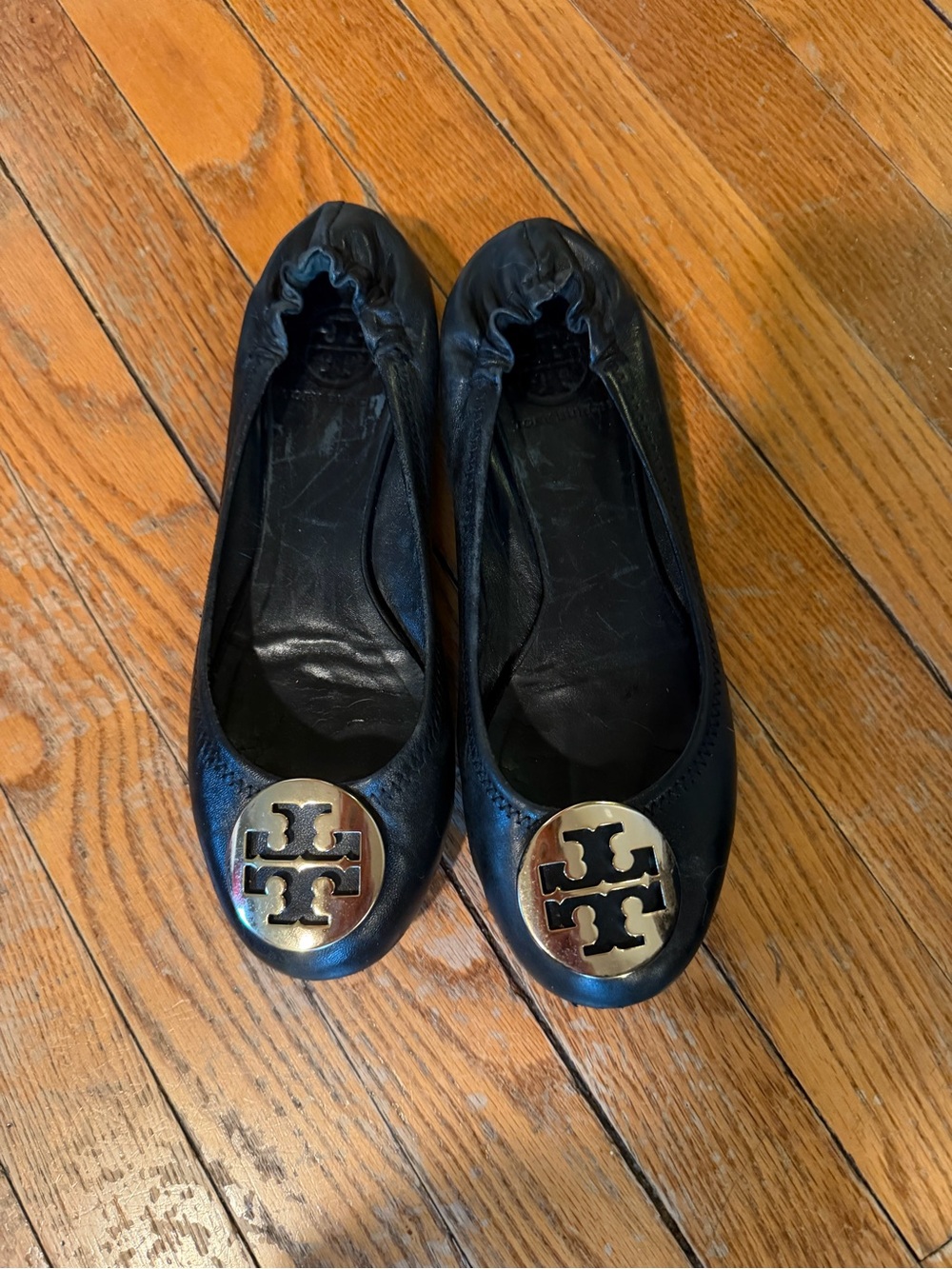 Tory Burch Black Leather Ballet Flats with Gold Logo Medallions